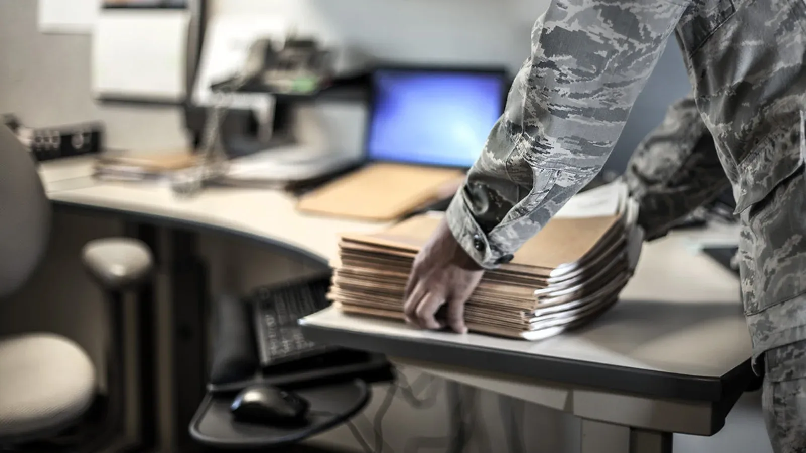 Office desk with business cards, contact cards, and a vertical file organizing zone